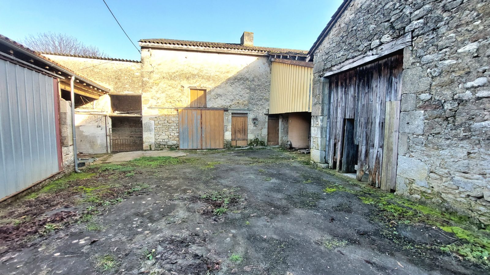 An interesting property offering a selection of stone built barns ripe for renovation.